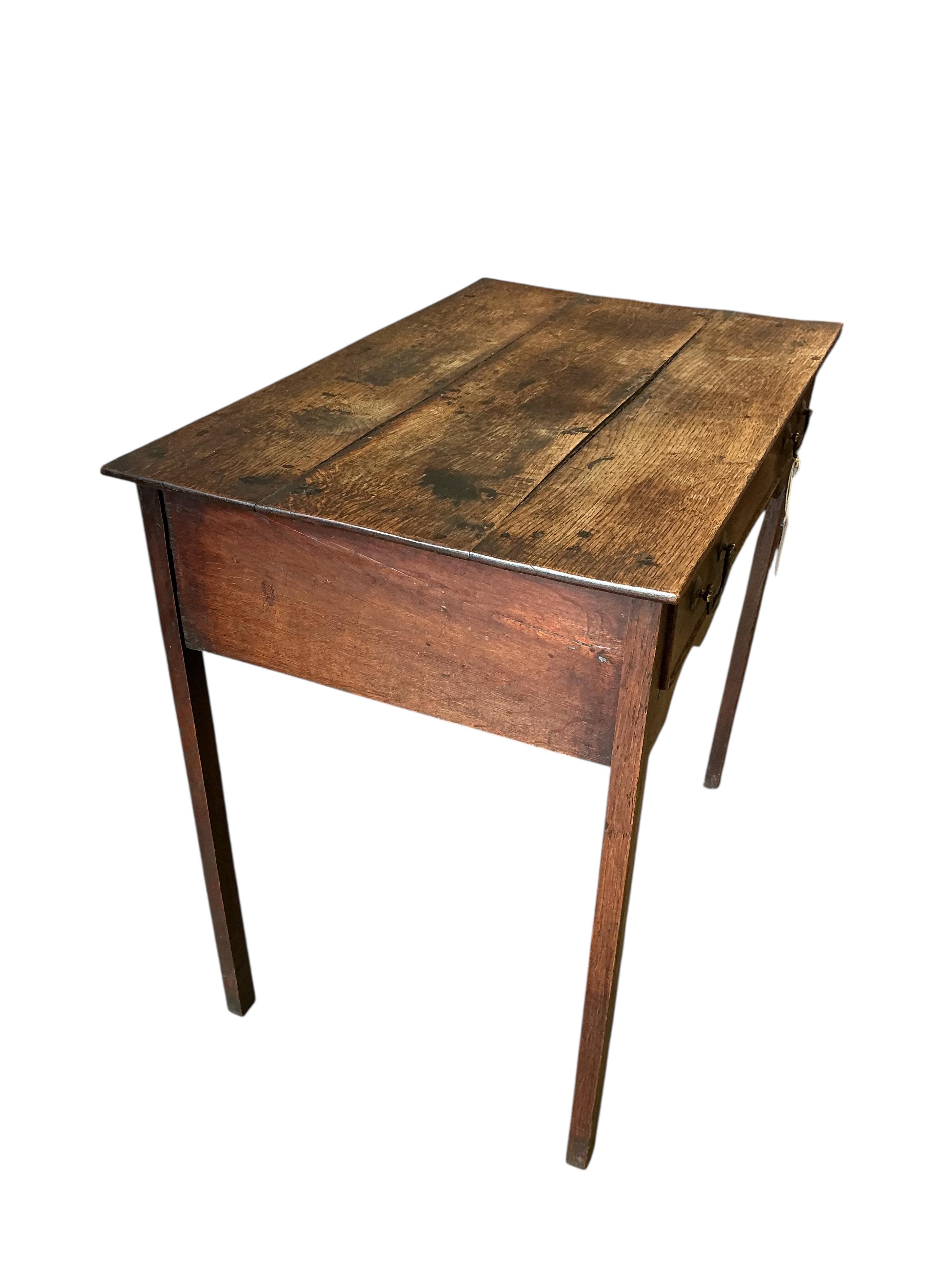An 18th century oak side table, width 76cm, depth 48cm, height 69cm
